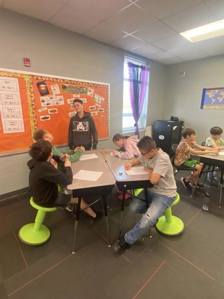Middle School students mentor elementary students in POAC program