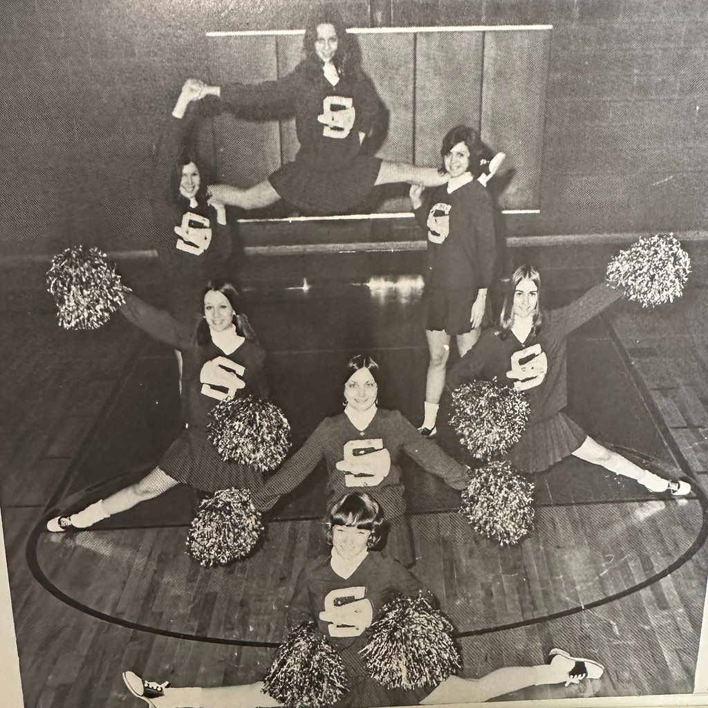 1973 cheerleaders pose for picture